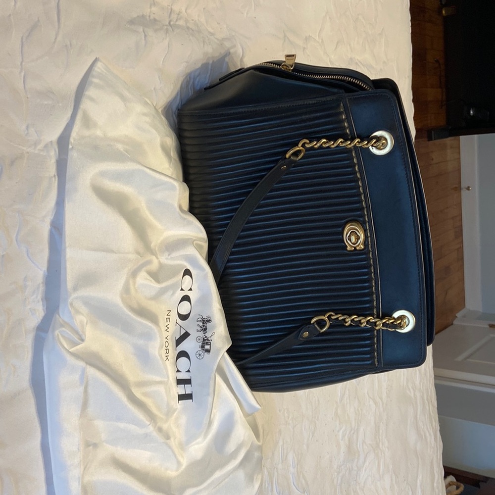 Coach soft leather bag. New, approximately 13” w x 10” h x 5 “ d.